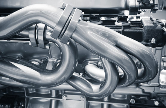 Shiny exhaust pipes. V12 Motor parts